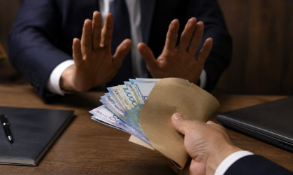 Налоговик запросил взятку 500.000 тенге и получил штраф в 15 миллионов